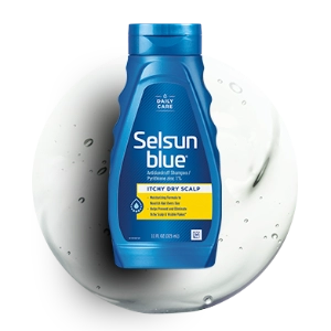 Bottle of Selsun blue® Itchy Dry Scalp shampoo.