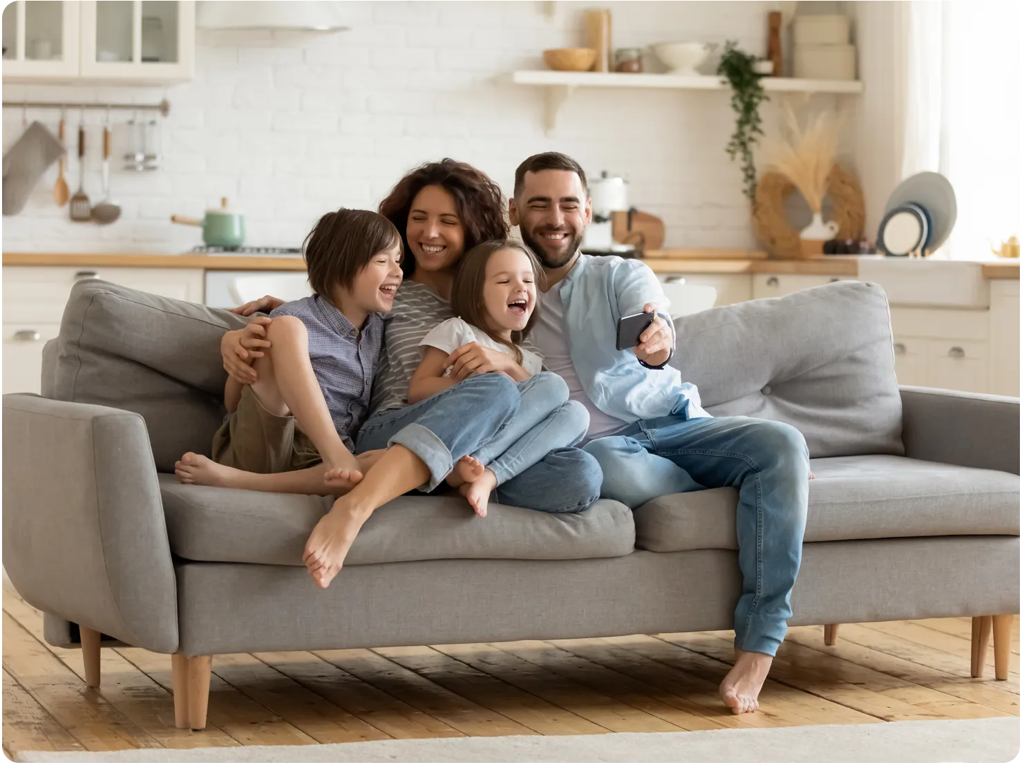 A family sitting together enjoying the indoors.