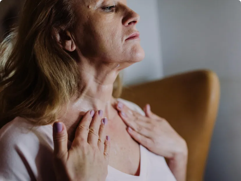 Close-up of a woman with natural skin, displaying signs of aging.